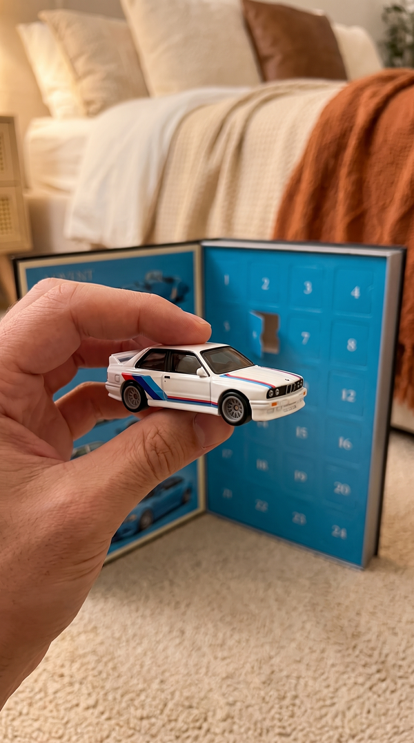 White 1980s touring race car die-cast with tricolour stripes