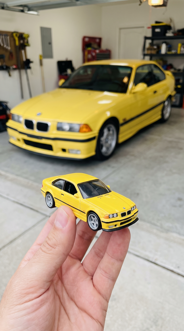 Yellow 1990s coupe die-cast